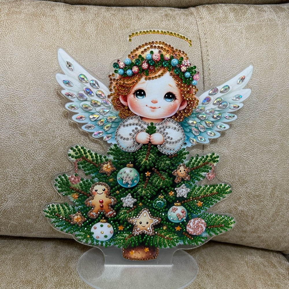 Festive Angel Tree  with Green and White Accents.   On  a stand